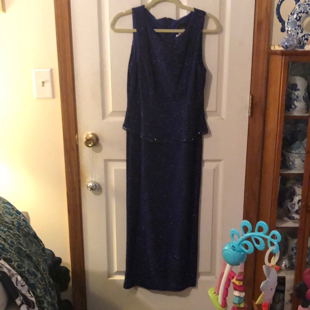 Elegant  sequined dress with beadingat the waistline